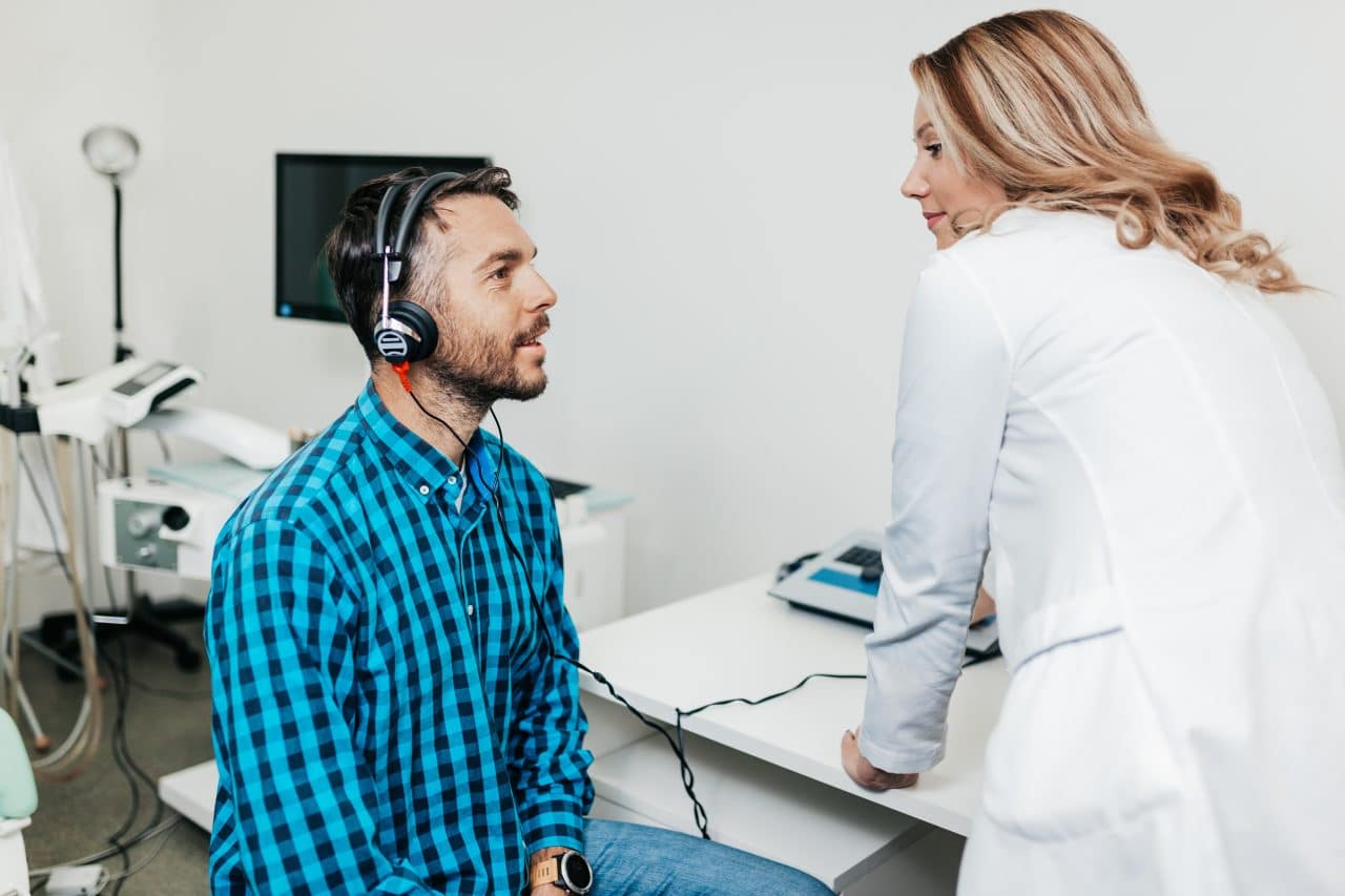 Man getting hearing test.